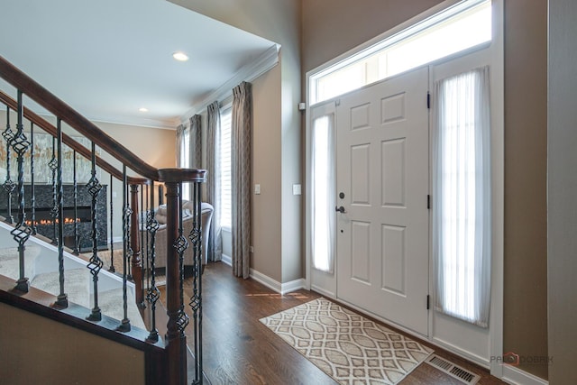 2550 Bayswater Cir, Gurnee, IL 60031 - foyer featuring ornamental molding, stairs, baseboards, dark wood finished floors, and recessed lighting