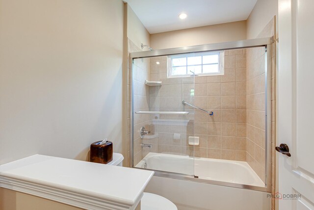 2550 Bayswater Cir, Gurnee, IL 60031 - bathroom with toilet and combined bath / shower with glass door