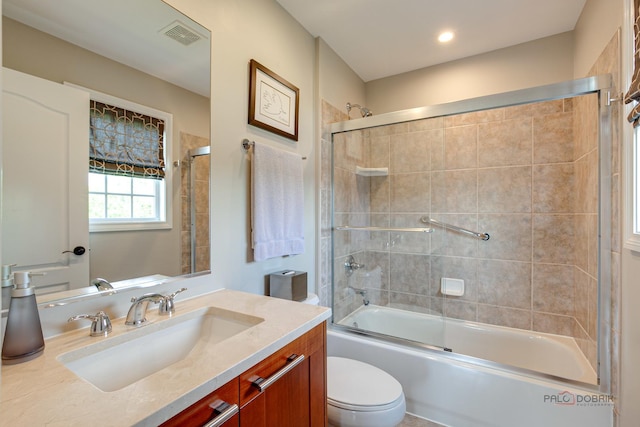2550 Bayswater Cir, Gurnee, IL 60031 - bathroom featuring vanity, toilet, and enclosed tub / shower combo