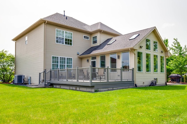 2550 Bayswater Cir, Gurnee, IL 60031 - rear view of property featuring a wooden deck, a yard, cooling unit, and roof with shingles