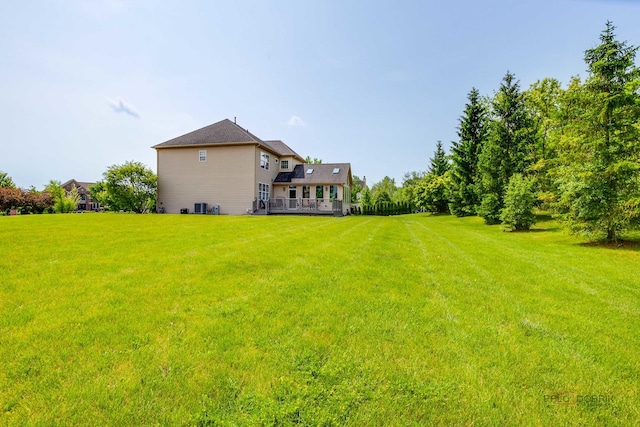 2550 Bayswater Cir, Gurnee, IL 60031 - view of green lawn with a wooden deck