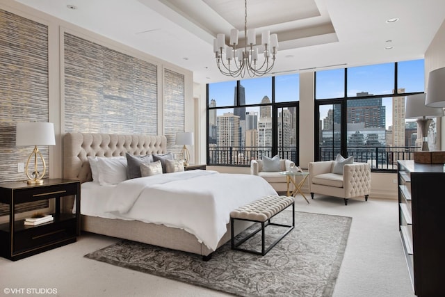 400 W Ontario St Unit 1801, Chicago, IL 60654 - bedroom with a view of skyline, a chandelier, carpet floors, multiple windows, and floor to ceiling windows