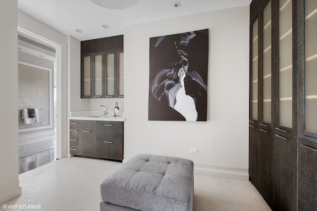 400 W Ontario St Unit 1801, Chicago, IL 60654 - living area featuring light carpet, wet bar, and baseboards