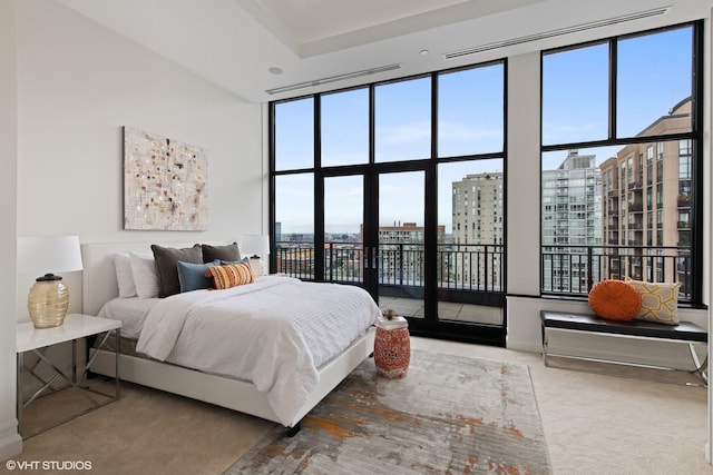 400 W Ontario St Unit 1801, Chicago, IL 60654 - carpeted bedroom with multiple windows, a city view, and access to exterior