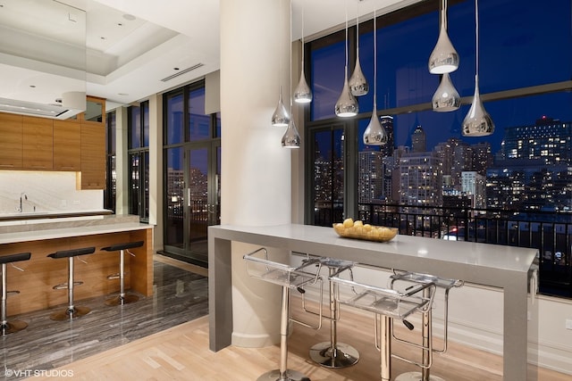 400 W Ontario St Unit 1801, Chicago, IL 60654 - bar featuring wood finished floors and a sink