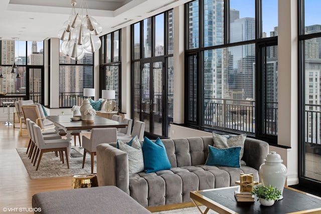 400 W Ontario St Unit 1801, Chicago, IL 60654 - sunroom featuring a chandelier and a city view