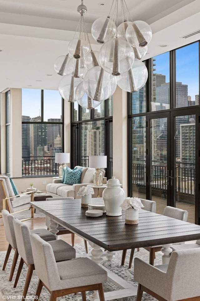 400 W Ontario St Unit 1801, Chicago, IL 60654 - sunroom with a chandelier and a view of city