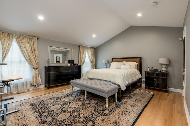 6700 N Monticello Ave, Lincolnwood, IL 60712 - bedroom with baseboards, recessed lighting, wood finished floors, and lofted ceiling