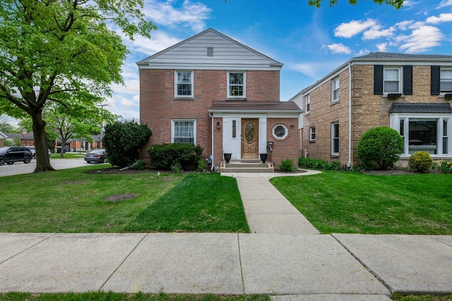 6700 N Monticello Ave, Lincolnwood, IL 60712 - traditional-style home with brick siding and a front lawn
