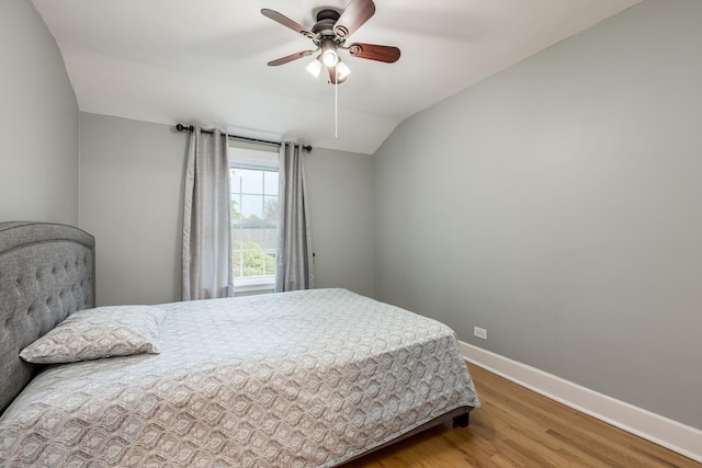 6700 N Monticello Ave, Lincolnwood, IL 60712 - bedroom featuring baseboards, a ceiling fan, lofted ceiling, and wood finished floors
