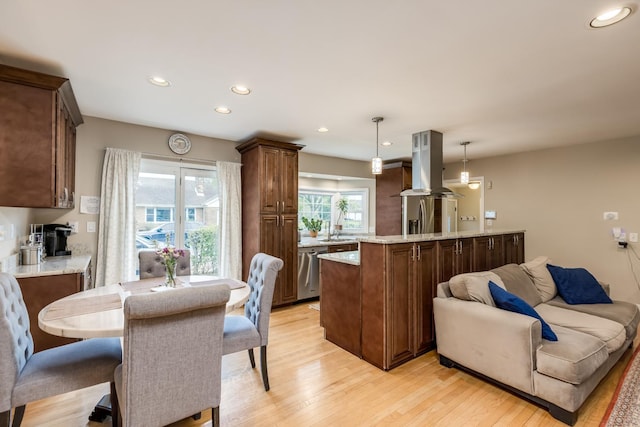 6700 N Monticello Ave, Lincolnwood, IL 60712 - kitchen featuring light wood finished floors, recessed lighting, decorative light fixtures, island range hood, and stainless steel dishwasher