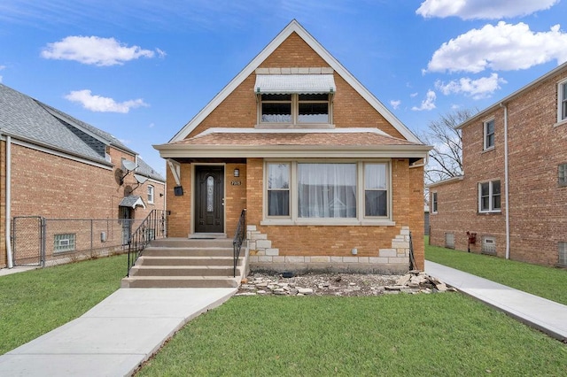 7315 S California Ave, Chicago, IL 60629 - bungalow featuring brick siding, a front lawn, and fence