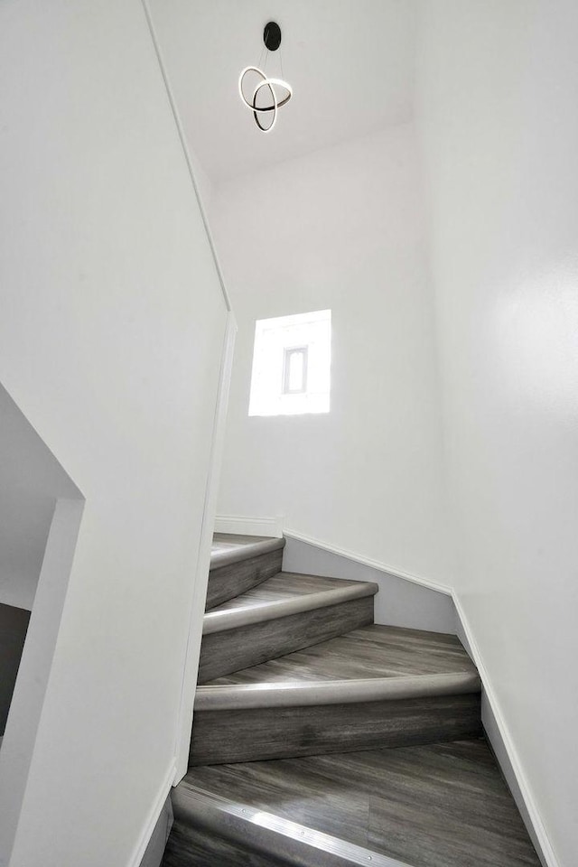 7315 S California Ave, Chicago, IL 60629 - stairs featuring baseboards