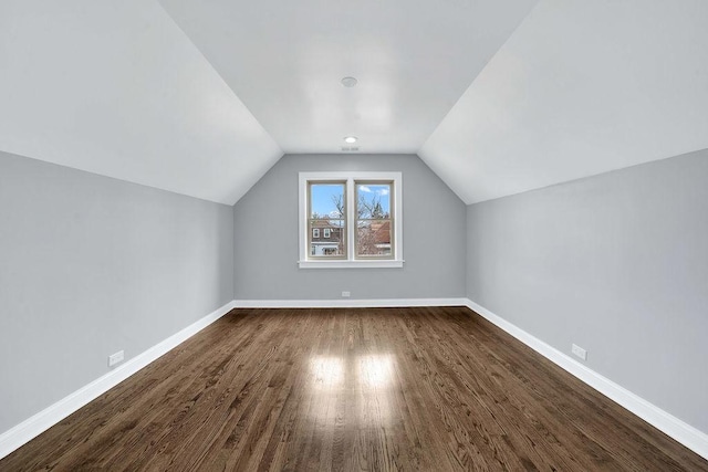 7315 S California Ave, Chicago, IL 60629 - bonus room featuring baseboards, dark wood finished floors, and vaulted ceiling