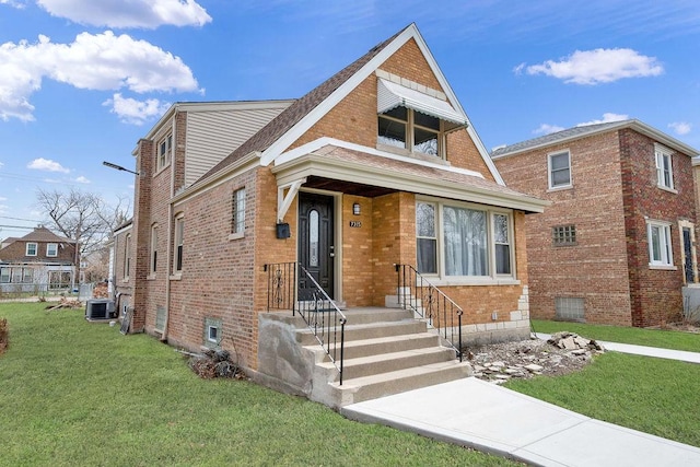 7315 S California Ave, Chicago, IL 60629 - bungalow-style house with brick siding, a shingled roof, a front lawn, and cooling unit