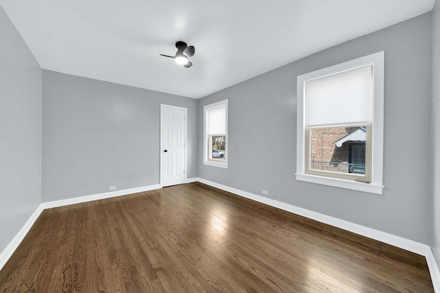 7315 S California Ave, Chicago, IL 60629 - unfurnished bedroom with baseboards, dark wood finished floors, and a closet