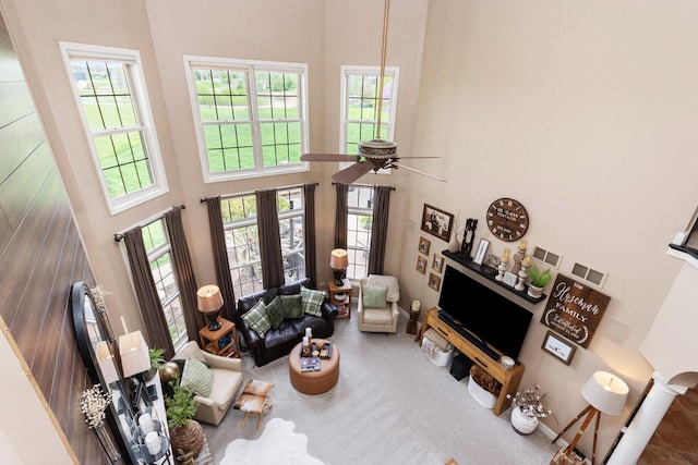 7659 Fairway Dr, Yorkville, IL 60560 - living room with a ceiling fan, a high ceiling, and carpet flooring