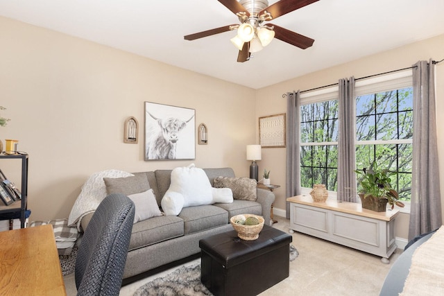 7659 Fairway Dr, Yorkville, IL 60560 - living room with light colored carpet, a ceiling fan, and baseboards