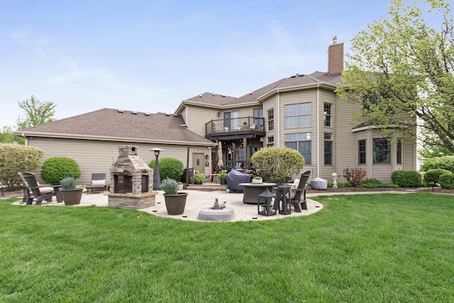7659 Fairway Dr, Yorkville, IL 60560 - back of house with an outdoor fireplace, a chimney, a patio area, and a balcony