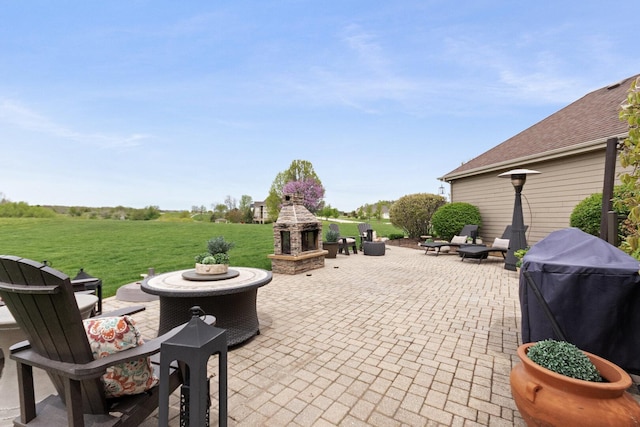 7659 Fairway Dr, Yorkville, IL 60560 - view of patio with an outdoor stone fireplace
