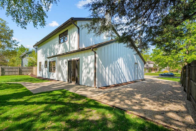 back of house featuring a patio area