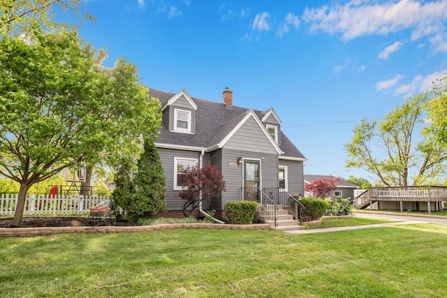12540 S Tripp Ave, Alsip, IL 60803 - new england style home with a shingled roof, a chimney, and a deck