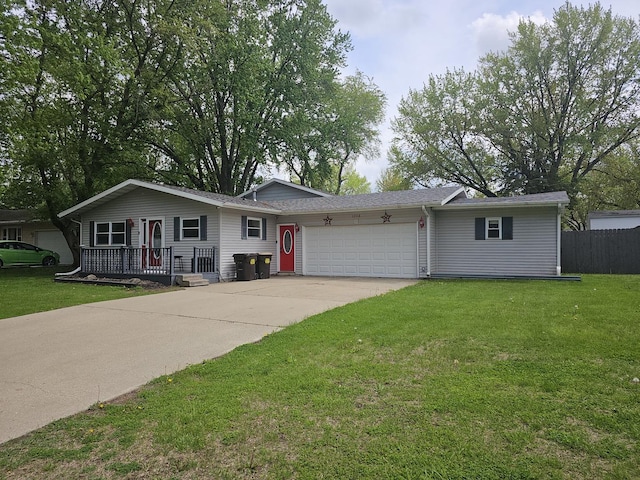 1208 Minkel St, Rock Falls, IL 61071 - ranch-style home featuring a garage, fence, concrete driveway, and a front lawn
