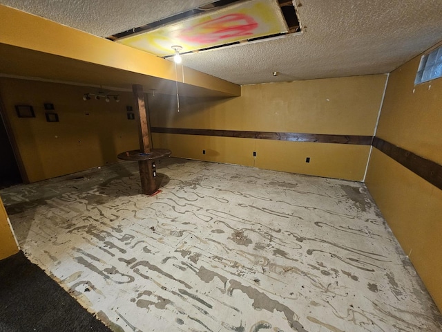 1208 Minkel St, Rock Falls, IL 61071 - finished below grade area featuring a textured ceiling