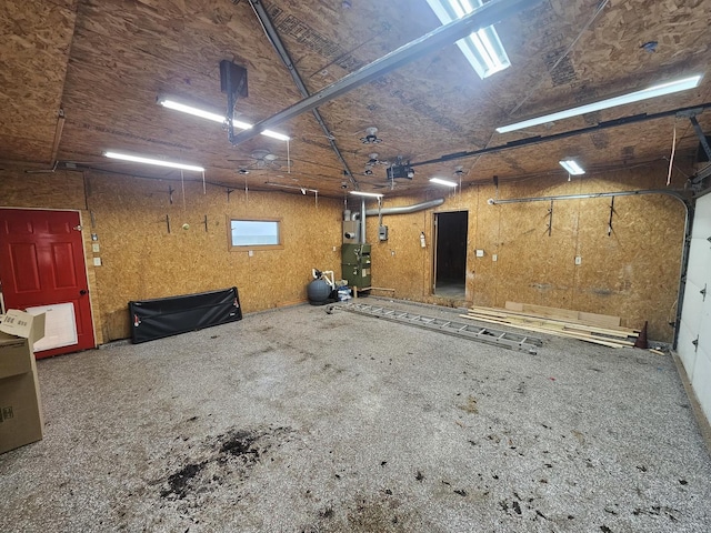 1208 Minkel St, Rock Falls, IL 61071 - garage with a workshop area and a garage door opener