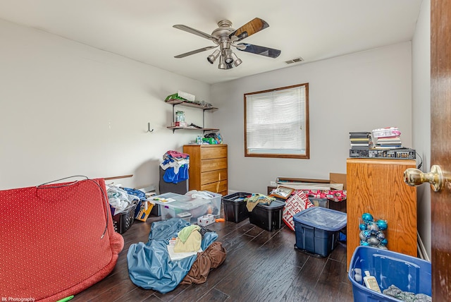 storage room with a ceiling fan and visible vents