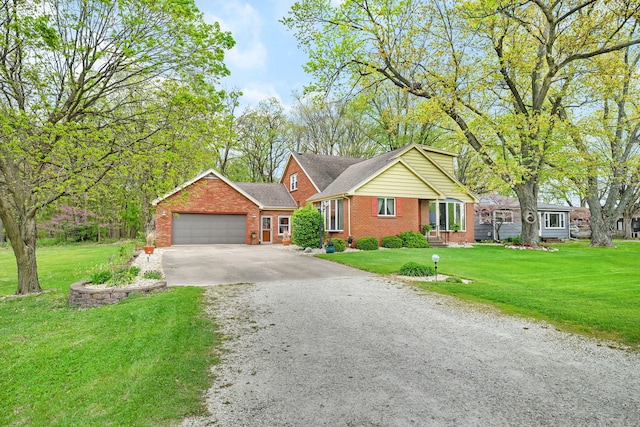 single story home with driveway, brick siding, an attached garage, a shingled roof, and a front lawn