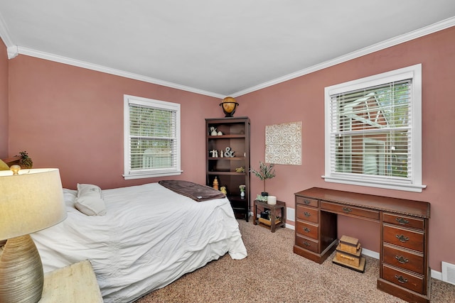 bedroom with light carpet, baseboards, visible vents, and ornamental molding