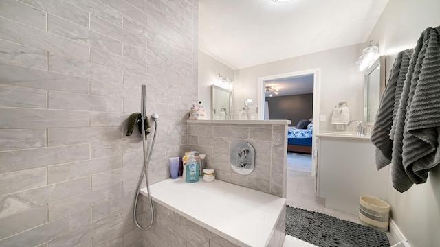 full bathroom with connected bathroom and a walk in shower