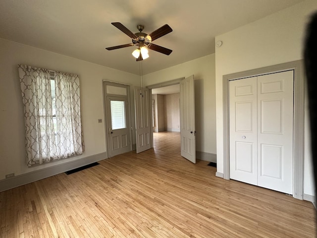 503 N William St, Farmer City, IL 61842 - interior space featuring light wood-style floors, baseboards, and ceiling fan