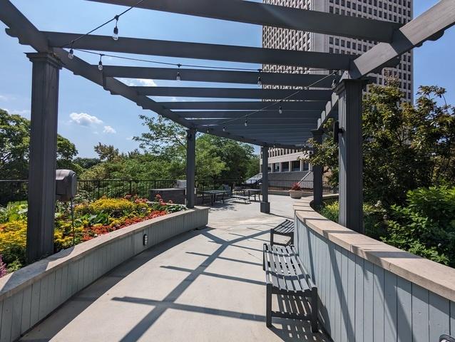 exterior space with a patio and a pergola