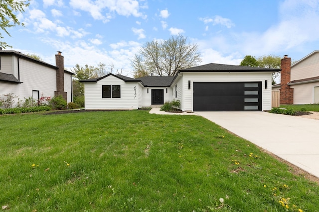 617 Sara Ln, Naperville, IL 60565 - view of front of property featuring concrete driveway, an attached garage, and a front yard