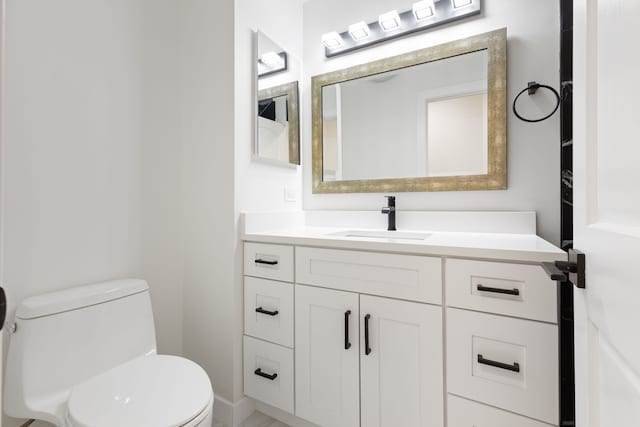 617 Sara Ln, Naperville, IL 60565 - half bath with vanity, baseboards, and toilet