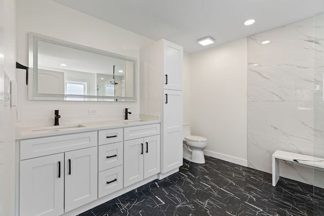 617 Sara Ln, Naperville, IL 60565 - bathroom featuring double vanity, toilet, a sink, and marble finish floor