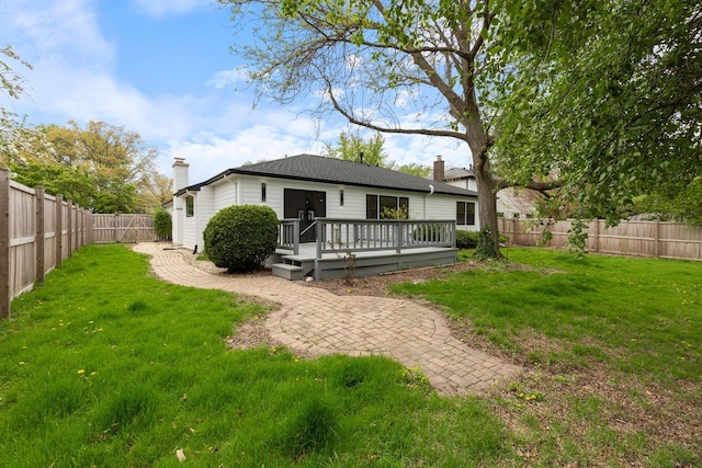 617 Sara Ln, Naperville, IL 60565 - back of house with a fenced backyard, a yard, a chimney, and a deck