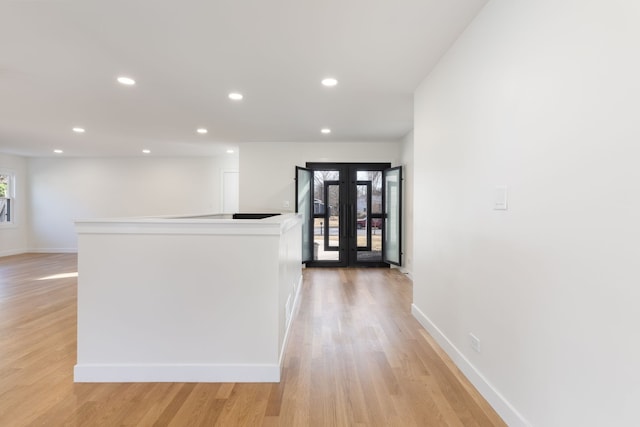 617 Sara Ln, Naperville, IL 60565 - corridor featuring recessed lighting, light wood-style flooring, baseboards, and french doors