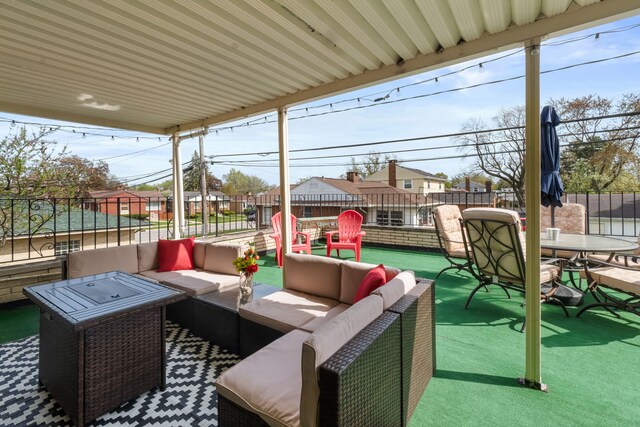 view of patio featuring a fenced backyard, a residential view, and an outdoor hangout area