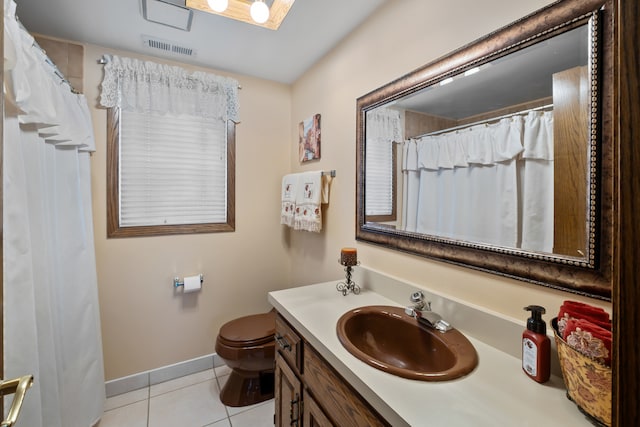 6338 Parkwood Ct, Oak Forest, IL 60452 - full bathroom featuring tile patterned flooring, toilet, vanity, and baseboards