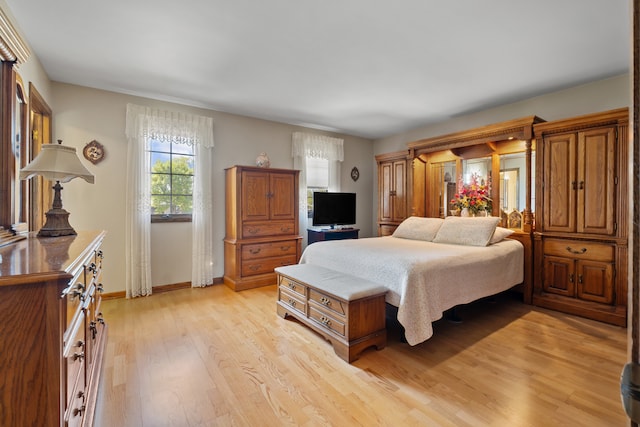 6338 Parkwood Ct, Oak Forest, IL 60452 - bedroom featuring light wood finished floors and baseboards