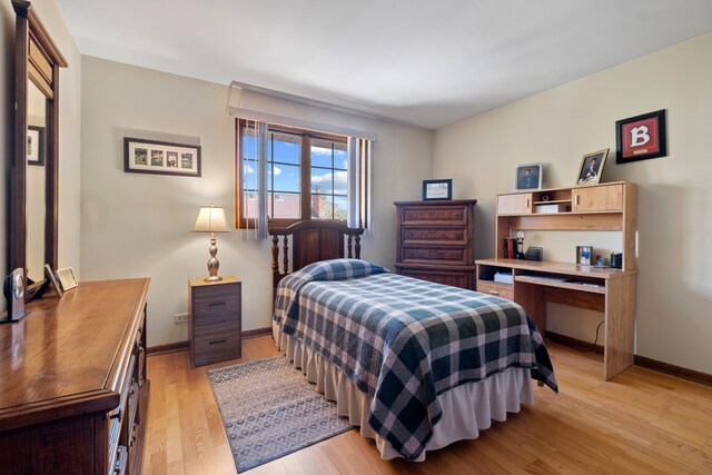 6338 Parkwood Ct, Oak Forest, IL 60452 - bedroom featuring light wood-type flooring, baseboards, and a desk