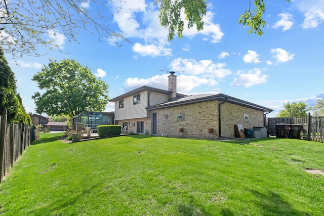 6338 Parkwood Ct, Oak Forest, IL 60452 - back of house with brick siding and a chimney
