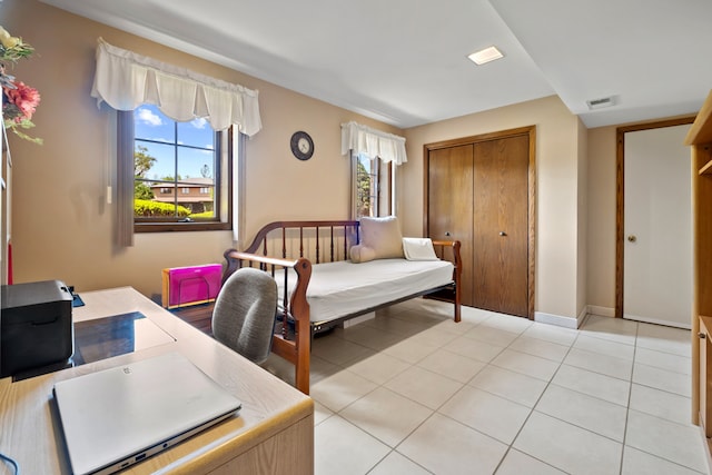 6338 Parkwood Ct, Oak Forest, IL 60452 - bedroom with a desk, a closet, baseboards, and light tile patterned flooring