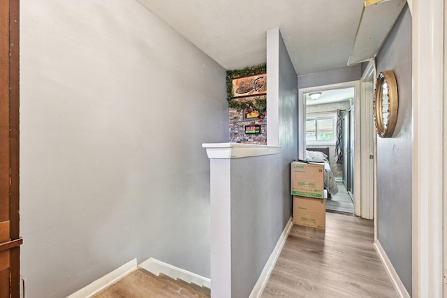 7303 N Campbell Ave Unit A, Chicago, IL 60645 - hall with an upstairs landing, baseboards, and wood finished floors