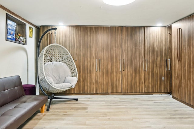 7303 N Campbell Ave Unit A, Chicago, IL 60645 - sitting room with light wood-style flooring and recessed lighting