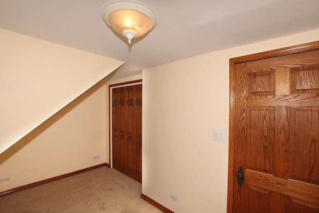 6511 174th St, Tinley Park, IL 60477 - additional living space with light carpet and baseboards