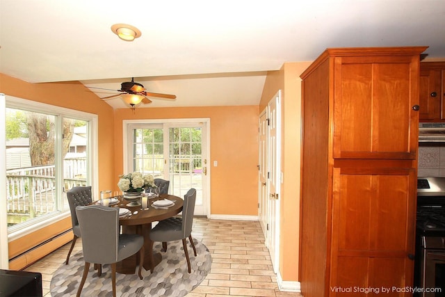 6511 174th St, Tinley Park, IL 60477 - dining area featuring baseboard heating, a ceiling fan, lofted ceiling, and baseboards
